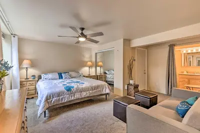 a large bedroom with a bed and a couch at Walk to Frisco Main St Townhome Steps to Trail! in Frisco