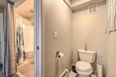 a bathroom with a toilet and a shower at Walk to Frisco Main St Townhome Steps to Trail! in Frisco