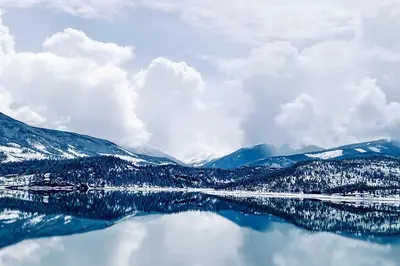 a view of a lake with snow covered mountains at Walk to Frisco Main St Townhome Steps to Trail! in Frisco