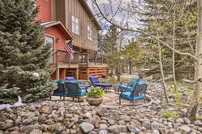 a yard with chairs and a house at Walk to Frisco Main St Townhome Steps to Trail! in Frisco
