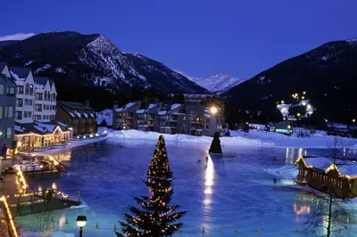 a christmas tree in the middle of a town at night at Family Friendly 3 Bedroom Vacation Rental In West Keystone Resort Along The Snake River With Pool And Hot Tub in Keystone