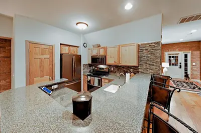 a kitchen with a counter top in a room at Family Friendly 3 Bedroom Vacation Rental In West Keystone Resort Along The Snake River With Pool And Hot Tub in Keystone