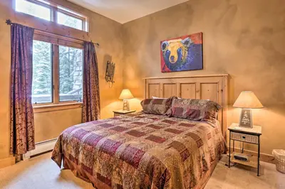 a bedroom with a bed and a window at Ski-Out Keystone Resort Condo with Private Balcony in Keystone