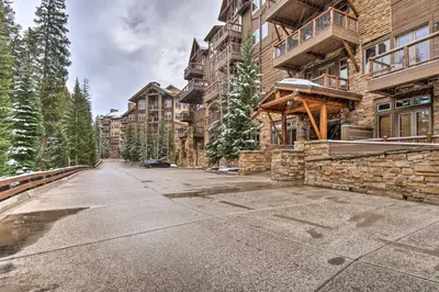 an empty street in front of a large building at Ski-Out Keystone Resort Condo with Private Balcony in Keystone