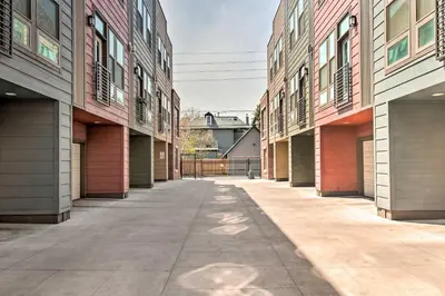 an empty alleyway between buildings in a city at Rooftop Deck and City Views Denver Abode! in Denver
