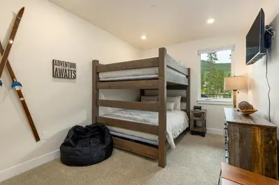 a bedroom with two bunk beds in a room at 202 Clearwater Lofts condo in Keystone