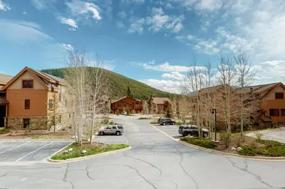 a street in a small town with a mountain at Antlers Gulch #304 in Keystone