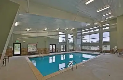 a large swimming pool in a large building at Hi Country 816 in Winter Park