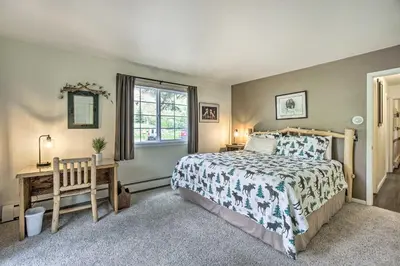 a bedroom with a bed and a window at Cozy Condo on Fall River - 1 Mile to RMNP Gate! in Estes Park