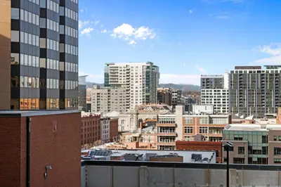 a view of a city skyline with tall buildings at 1777 Larimer St #903 in Denver