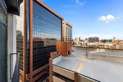 a view of a city skyline from a building at 1777 Larimer St #903 in Denver