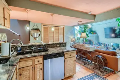 a kitchen with a sink and a counter top at 1374 S Pennsylvania St in Denver