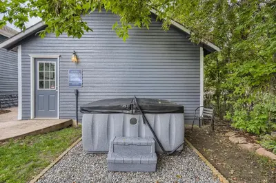 a house with a bath tub sitting outside of it at 113 4th Ave in Longmont