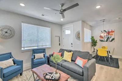 a living room with a couch and two chairs at Gorgeous Greeley Getaway - Close to Parks! in Greeley