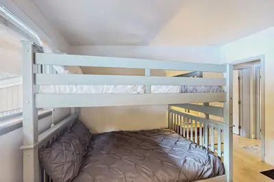 a bunk bed room with two bunk beds at Rustic Relaxation in Winter Park in Winter Park
