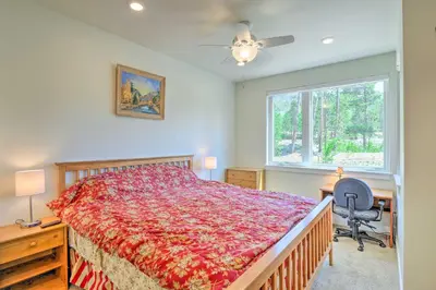 a bedroom with a bed and a desk and a window at Condo 2 Mi to Keystone Resort Relax Fireside! in Keystone