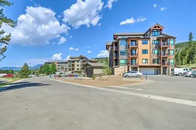 an empty parking lot in front of a building at Condo 2 Mi to Keystone Resort Relax Fireside! in Keystone