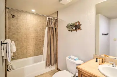 a bathroom with a tub and a toilet and a sink at Less Than 1 Mi to Slopes Mtn-View Keystone Condo in Dillon