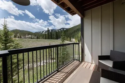a balcony with a view of a mountain at Premium Unit 4466 - One Bedroom withKitchenette - Fraser Crossing Founders Pointe condo in Winter Park