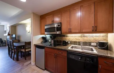 a kitchen with a sink and a microwave at Winter Park FF Premium-Rated 4443 in Winter Park