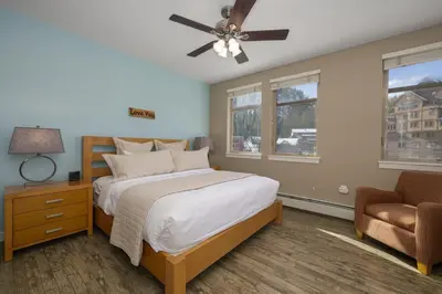 a bedroom with a bed and a ceiling fan at Value Unit 4440 - Two Bedroom - Fraser Crossing Founders Pointe condo in Winter Park
