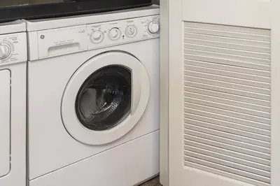 a white washer and dryer in a kitchen at Value Unit 4440 - Two Bedroom - Fraser Crossing Founders Pointe condo in Winter Park