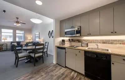 a kitchen and dining room with a table and a dining room at Winter Park FF Premium-Rated 3619 in Winter Park