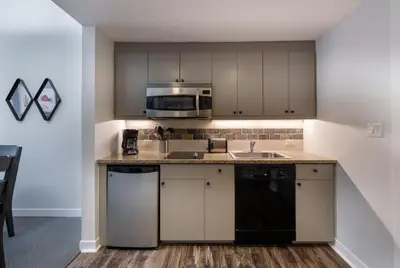 a kitchen with a sink and a microwave at Winter Park FF Premium-Rated 3619 in Winter Park