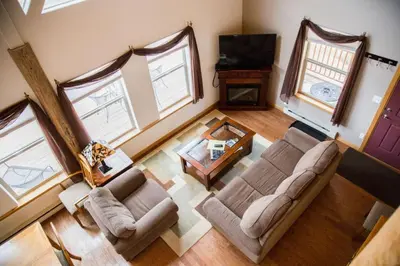 an overhead view of a living room with couches and a table at Old Man Mountain, Spacious lodge with loft Great for families, Dogs allowed in Estes Park
