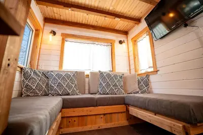 a bench in the back of a tiny house at WeeCasa Tiny Home Resort in Lyons