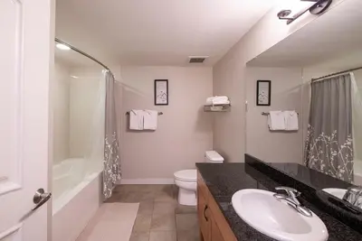 a bathroom with a sink and a toilet and a shower at Winter Park FF Premium-Rated 4457 in Winter Park