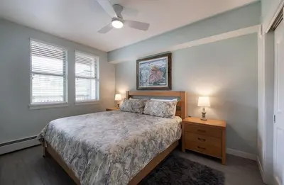 a bedroom with a bed and a ceiling fan at Winter Park FF Premium-Rated 4462 in Winter Park