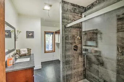a bathroom with a shower and a sink at Moose Park Lodge Charming Walden Retreat! in Walden