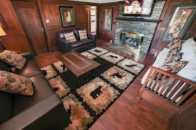 a living room with a couch and a fireplace at Aspen Mountain Lodge - #3357 in Estes Park