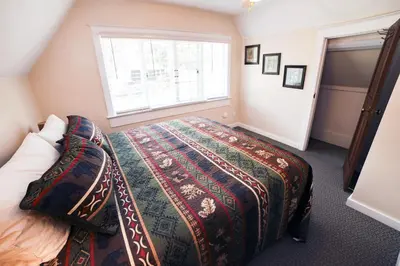 a bedroom with a bed and a window at Aspen Mountain Lodge - #3357 in Estes Park