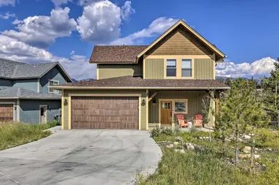 a house with a driveway and a garage at Updated Mtn Home about 6 Mi to Winter Park Resort in Fraser