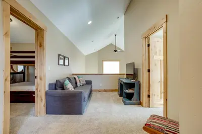 a living room with a couch and a bunk bed at Updated Mtn Home about 6 Mi to Winter Park Resort in Fraser