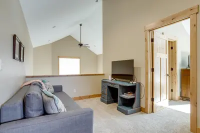 a living room with a couch and a television at Updated Mtn Home about 6 Mi to Winter Park Resort in Fraser