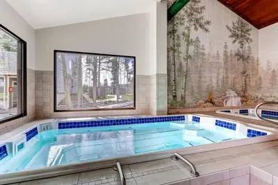 a large swimming pool in a house at 2 Bedroom Condo In West Keystone Near Lakeside Village in Keystone