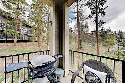 a stroller sitting on the porch of a house at 3 Bedroom Condo In West Keystone Near Lakeside Village in Keystone