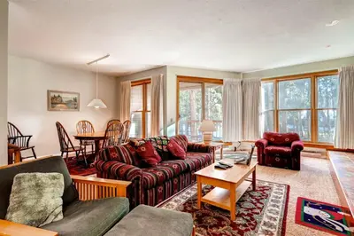 a living room with a couch and a table at North Keystone 1 Bedroom Near Conference Center in Keystone