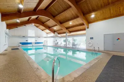 a large swimming pool in a large building at North Keystone 2 Bedroom Near Conference Center in Keystone