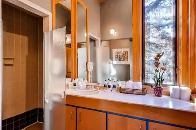 a bathroom with a sink and a mirror at North Keystone 2 Bedroom Near Conference Center in Keystone