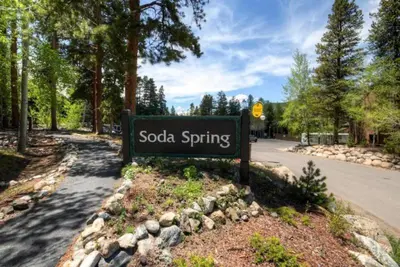 a sign for sooda spring on the side of a road at Soda Springs 3 Bedroom Townhome in Keystone