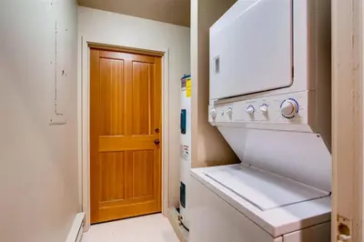 a white oven in a kitchen with a door at Soda Springs 3 Bedroom Townhome in Keystone