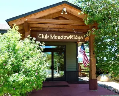 an entrance to a club meadowridge building at Pines at Meadow Ridge in Fraser