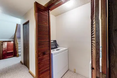 a laundry room with a washer and dryer at Vasquez Vista in Winter Park