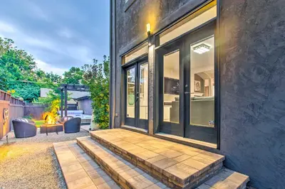 a home with a patio with a fire pit at Hot Tub and Outdoor Oasis Luxury Denver Home in Denver