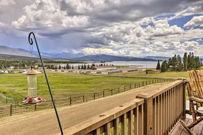 a view of a road from a porch with a pole at Game Room and Hot Tub Luxe Grand Lake Retreat! in Grand Lake