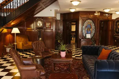 a living room with a couch and a table at The Boulder Broker in Boulder